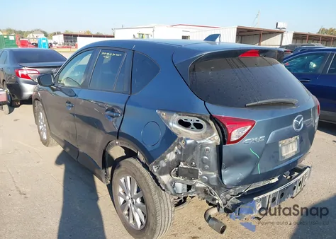 2015 Mazda Cx-5 Touring z USA, uszkodzony, nr VIN JM3KE2CY5F0471018